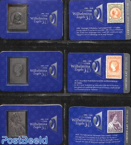 12 Silver Replica's of Wilhelmina stamps in album